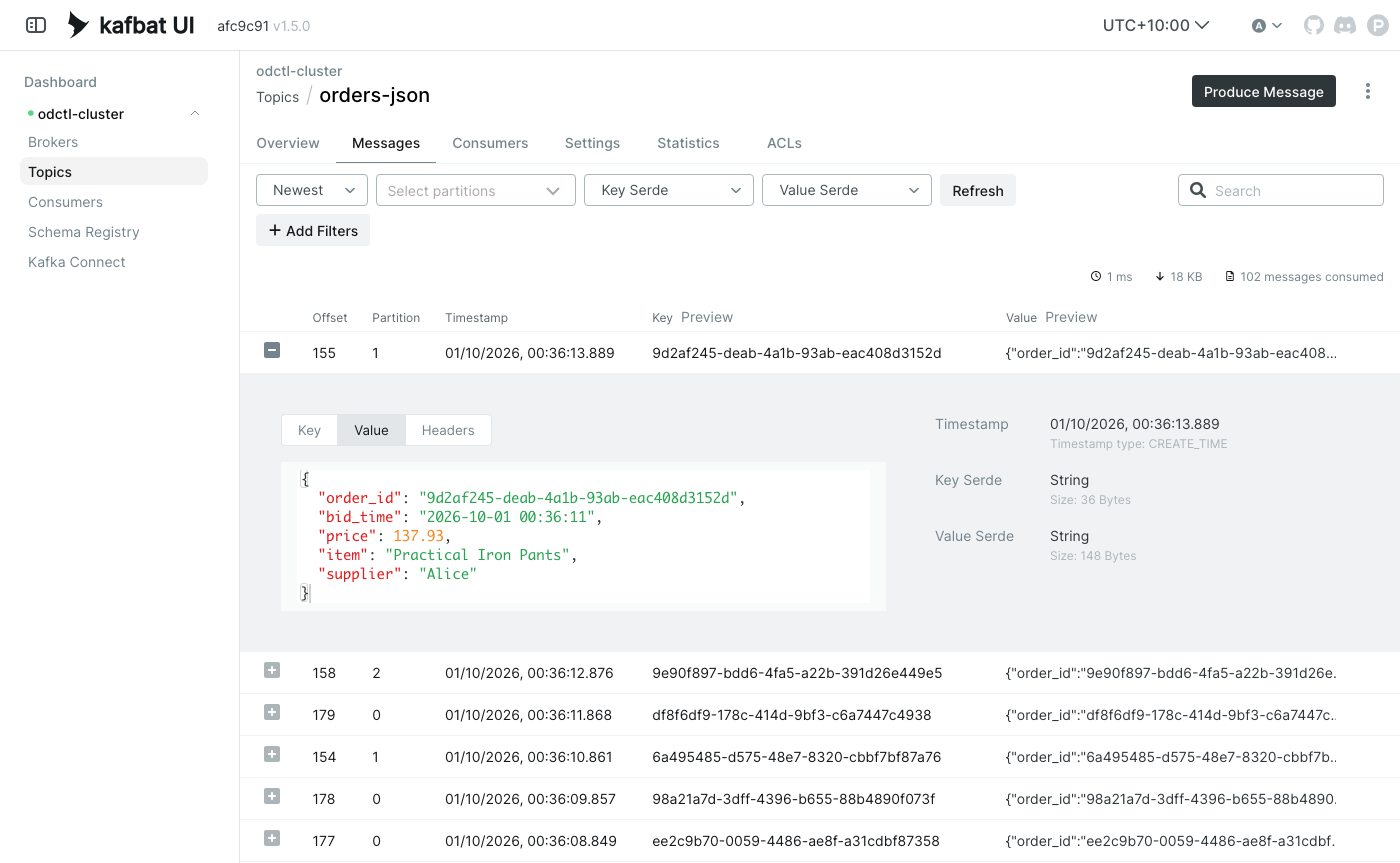 Order messages on the orders-json topic in Kafka UI Kafka UI messages tab of the orders-json topic, with the newest order expanded to show order_id, bid_time, price, item and supplier